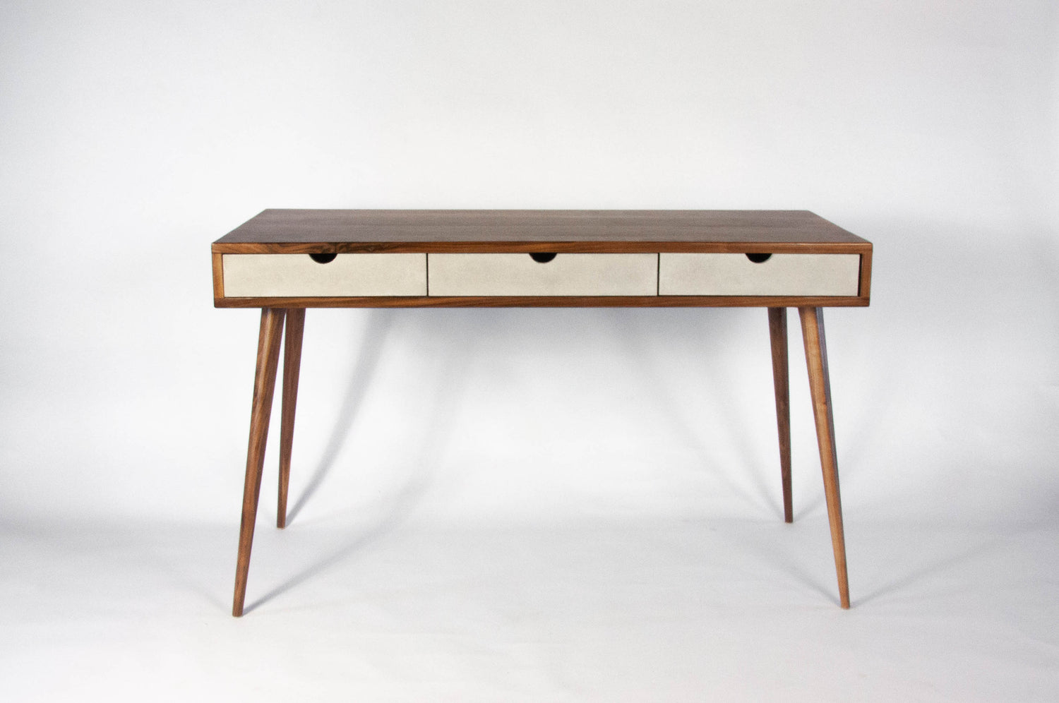 Black walnut office desk with three concrete drawers